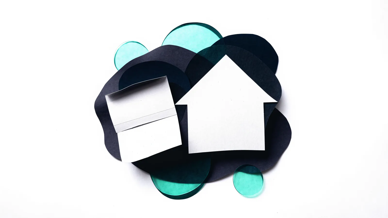 Layered paper cut-out of a house beside a folded document and coin-shaped discs, representing the parts of a mortgage payment