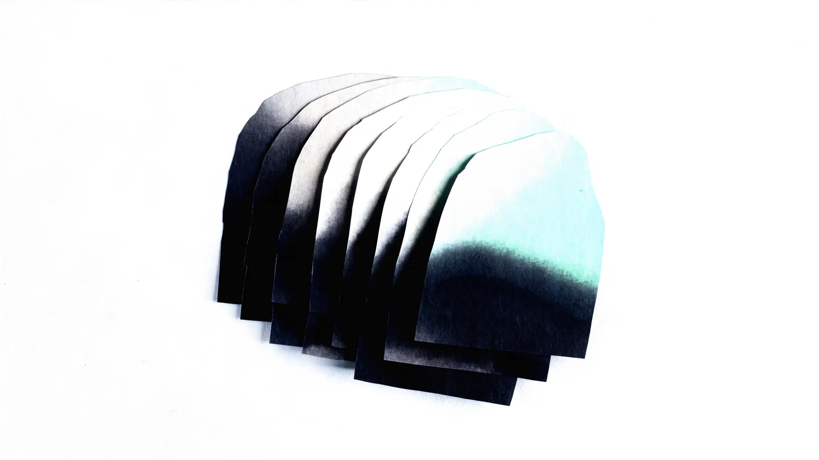 Stacked paper strips forming a descending curve, representing a loan balance shrinking over time